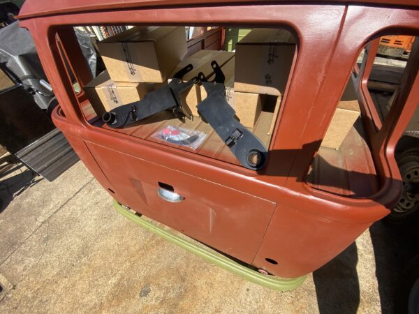 Wagenswest adjustable offset spring plates sitting ready to ship in the back of a very old vw bus
